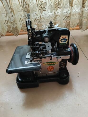 обмен с доплатой: Тигүүчү машина Кытай, Оверлок — 1