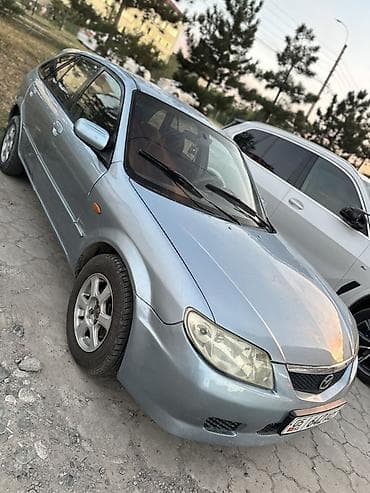 Продажа авто: Mazda Familia: 2002 г., 1.6 л, Механика, Бензин, Хэтчбэк — 2