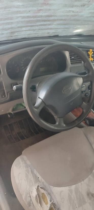 nissan cefiro 32: Mazda 323: 2001 г., 1.8 л, Механика, Бензин, Универсал — 6
