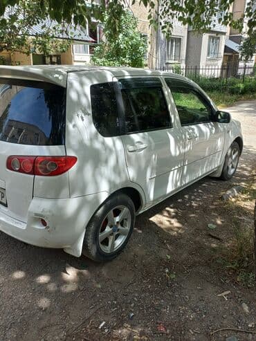 срочно продаю в связи с переездом: Mazda Demio: 2005 г., 1.4 л, Автомат, Бензин, Хетчбек — 3