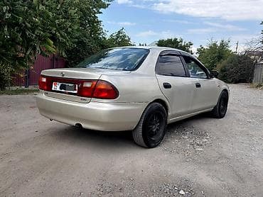 арбитальная машинка: Mazda 323: 1996 г., 1.5 л, Автомат, Бензин, Седан — 3