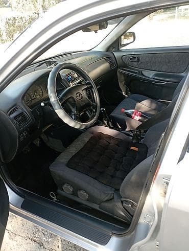 алмашаи: Mazda 626: 1998 г., 1.8 л, Ручные, Бензин, Седан — 4