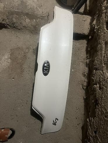 Унаа тетиктери: Багажниктин капкагынын коймосу Kia, Оригинал — 2