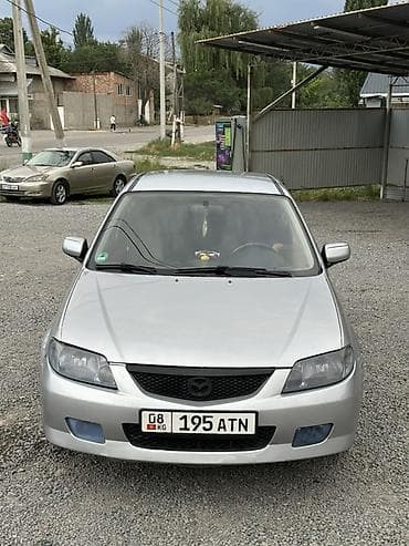 обмен на хариер: Mazda 323: 2001 г., 1.6 л, Механика, Бензин, Хэтчбэк — 2