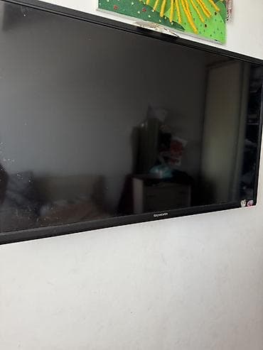 телевизор skyworth цена: Телевизор Skyworth, диагональ около 40–43". Плоская панель, тонкая — 3