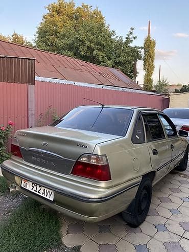 lancer 9: Daewoo Nexia: 2007 г., Механика, Бензин, Седан — 4