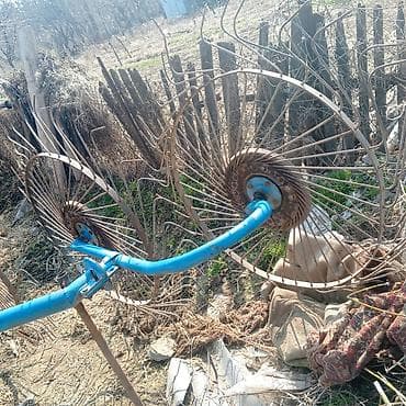 Грабли ворошилки: Грабли-ворошилки колесно-пальцевые, прицепные к трактору. Описание: - — 5