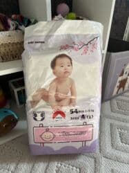 пуховой комбинезон для новорожденных: Продаю почти полную упаковку памперсов. Размер L. 9-13 кг Использовали — 1