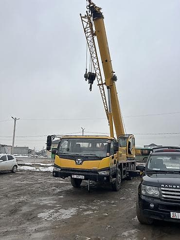 w210 55: Сдаю автокран, 25 тонн, Почасово — 1