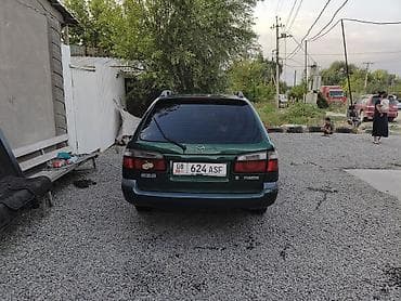 626 переходка: Mazda 626: 1999 г., 1.8 л, Механика, Бензин, Универсал — 6