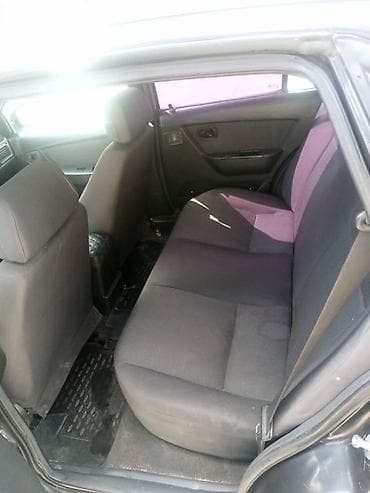 2011: Daewoo Nexia: 2011 г., 1.5 л, Механика, Бензин, Седан — 10