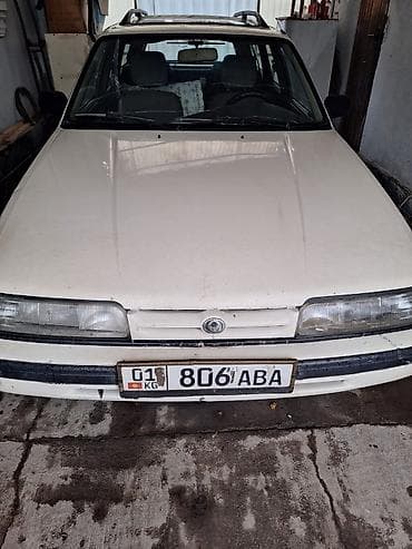90: Mazda 626: 1993 г., Универсал — 3