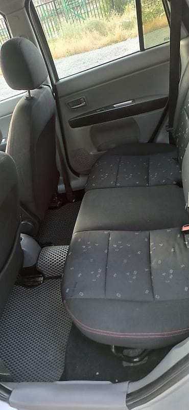 Mazda Demio: 2004 г., 1.5 л, Автомат, Бензин, Хэтчбэк — 9