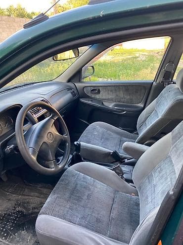 мотор на авто: Mazda 626: 1999 г., 1.8 л, Механика, Бензин, Универсал — 5