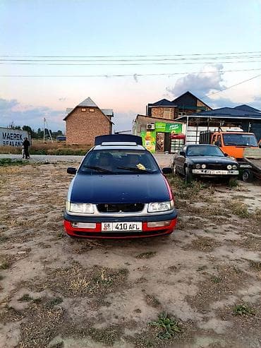 бампе: Volkswagen Passat: 1994 г., Седан — 5