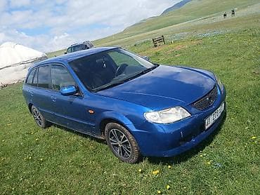 man 8: Mazda 323: 2003 г., 1.6 л, Механика, Бензин, Хэтчбэк — 1