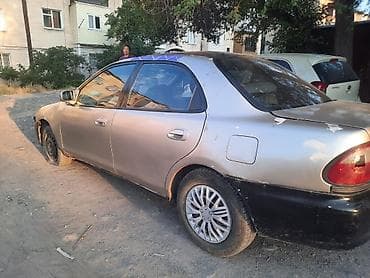 smart open: Mazda 323: 1997 г., 1.6 л, Автомат, Бензин — 4