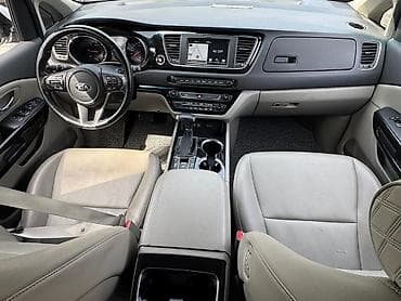 конвер: Kia Carnival (белый, рестайлинг) — просторный 7/8‑местный минивэн с — 4