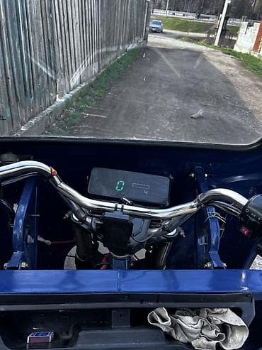 Скутерлер: Электрический трёхколёсный грузовой скутер (кабина с ветровым стеклом) — 1