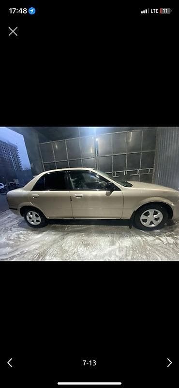 buick gl8: Mazda Capella: 2001 г., 1.5 л, Автомат, Бензин, Седан — 5