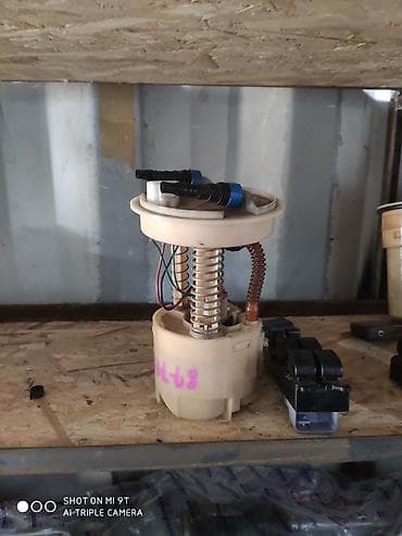 Топливный насос Мазда Демио — 1