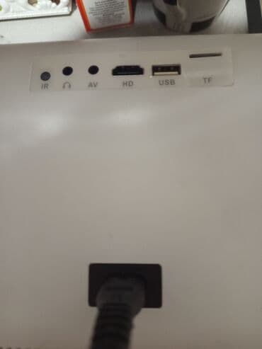 ТВ и видео: Портативный проектор с пультом ДУ - Компактный корпус с удобной — 4