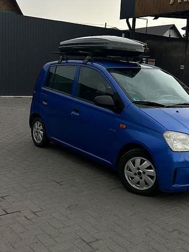 алмашаи: Daihatsu Cuore: 2004 г., 1 л, Механика, Бензин, Хэтчбэк — 1