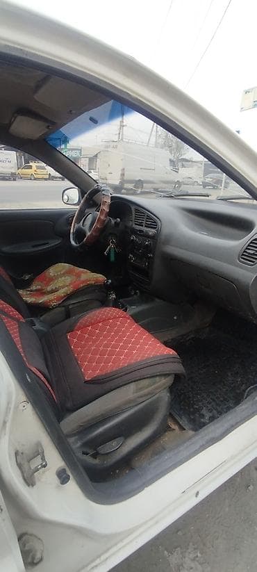 daihatsu cuare: Daewoo Lanos: 1998 г., Ручные, Седан — 3