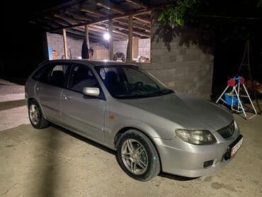 авто бафер: Mazda 323: 2002 г., 1.6 л, Механика, Бензин, Универсал — 1