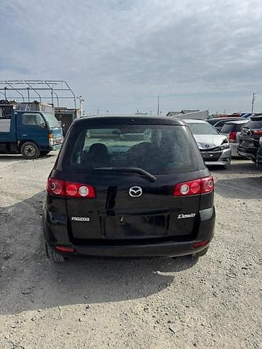 Автозапчасти: Крышка багажника Mazda, 2003 г., Б/у, Оригинал — 1