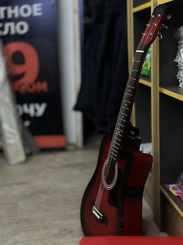 Акустическая гитара 6-струнная, форма корпуса Dreadnought с вырезом — 1