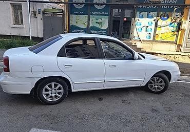 фара 55: Daewoo Nubira: 1999 г., 1.6 л, Механика, Бензин, Седан — 1