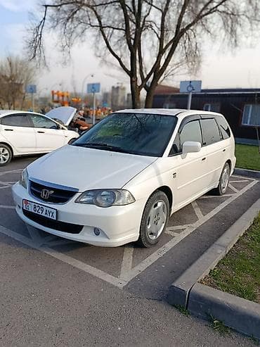 контактный: Honda Odyssey: 2002 г., 2.3 л, Типтроник, Бензин, Минивэн — 1