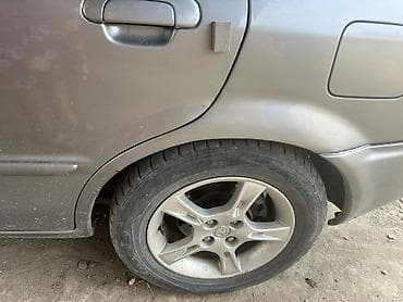 мини машины для взрослых: Mazda Familia: 2002 г., Механика, Бензин, Седан — 2