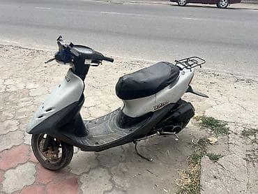 dd oo: Скутер Honda Dio (серебристый) - Кузов: компактный городской скутер с — 3