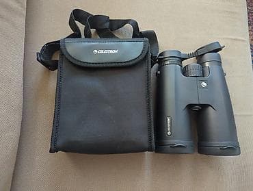 бинокил: Бинокль Celestron 12x50 из США. - Оптика: увеличение 12x, объективы — 3