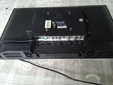 iphone хr: Телевизор VITYAS (жк/LED), диагональ около 24–26". На корпусе сзади — 6