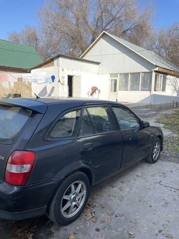 светы для дома: Mazda 323: 2000 г., 2 л, Механика, Бензиновая, Хэтчбэк — 5