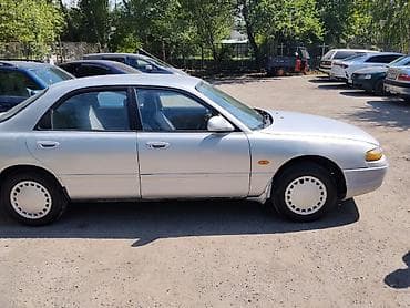 колпачки: Mazda Cronos: 1992 г., 2 л, Механика, Бензин, Седан — 2