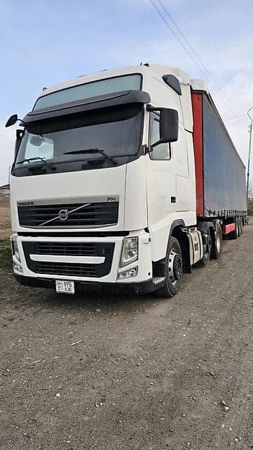 для такси авто: Тягач, Volvo, 2013 г., Тентованный — 1