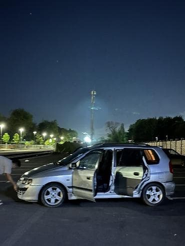 митсубиси спейс ранер: Mitsubishi Space Star: 2003 г., Универсал — 6