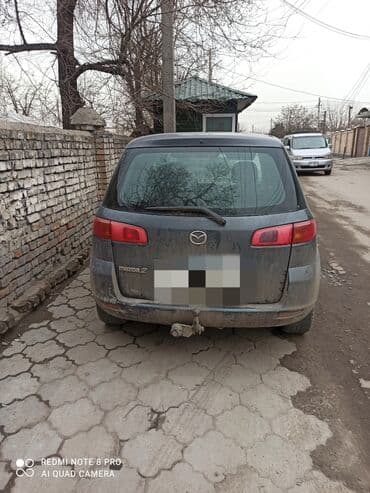 чехол на демио: Mazda 2: 2004 г., 1.4 л, Автомат, Бензин, Хэтчбэк — 1
