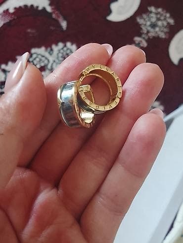Серьги-кольца Bvlgari (BVLGARI BVLGARI), bicolor - Дизайн — 1