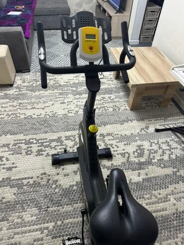 сколько стоит эллиптический тренажер: Велотренажер черного цвета с желтыми акцентами, предназначенный для — 1