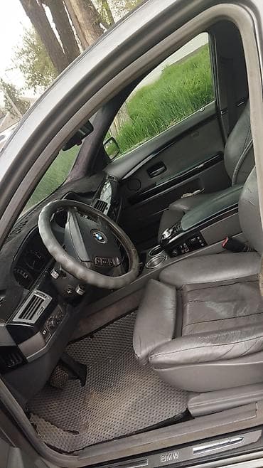 супорт степ: BMW 7 series: 2004 г., 4.4 л, Автомат, Бензин, Седан — 1