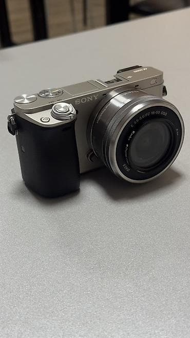 memory card: Камера Sony Alpha a6000 (серебристая) с объективом E PZ 16–50mm — 1