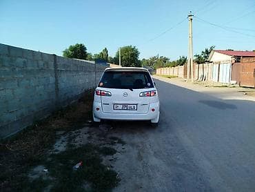 black edition: Mazda Demio: 2004 г., Хэтчбэк — 5