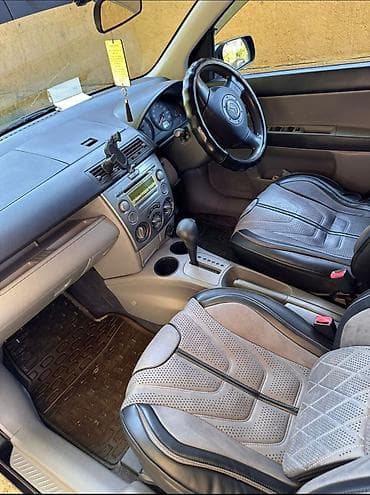 bcd com: Mazda Demio: 2003 г., 1.3 л, Автомат, Бензин, Универсал — 3