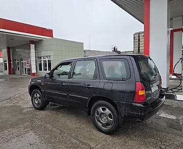 обмен транспорта: Mazda Tribute: 2001 г., 2 л, Механика, Газ, Внедорожник — 2