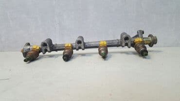 газовое оборудование на машину: Mitsubishi Galant Рампа с форсунками, Мицубиси Галант рампа с — 1